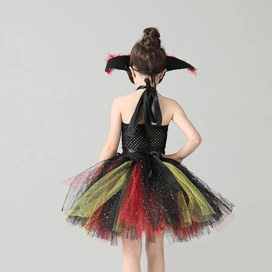 Girls sleeveless pirate costume dress with black sequins, red gauze mesh, and lace details on a black skirt.