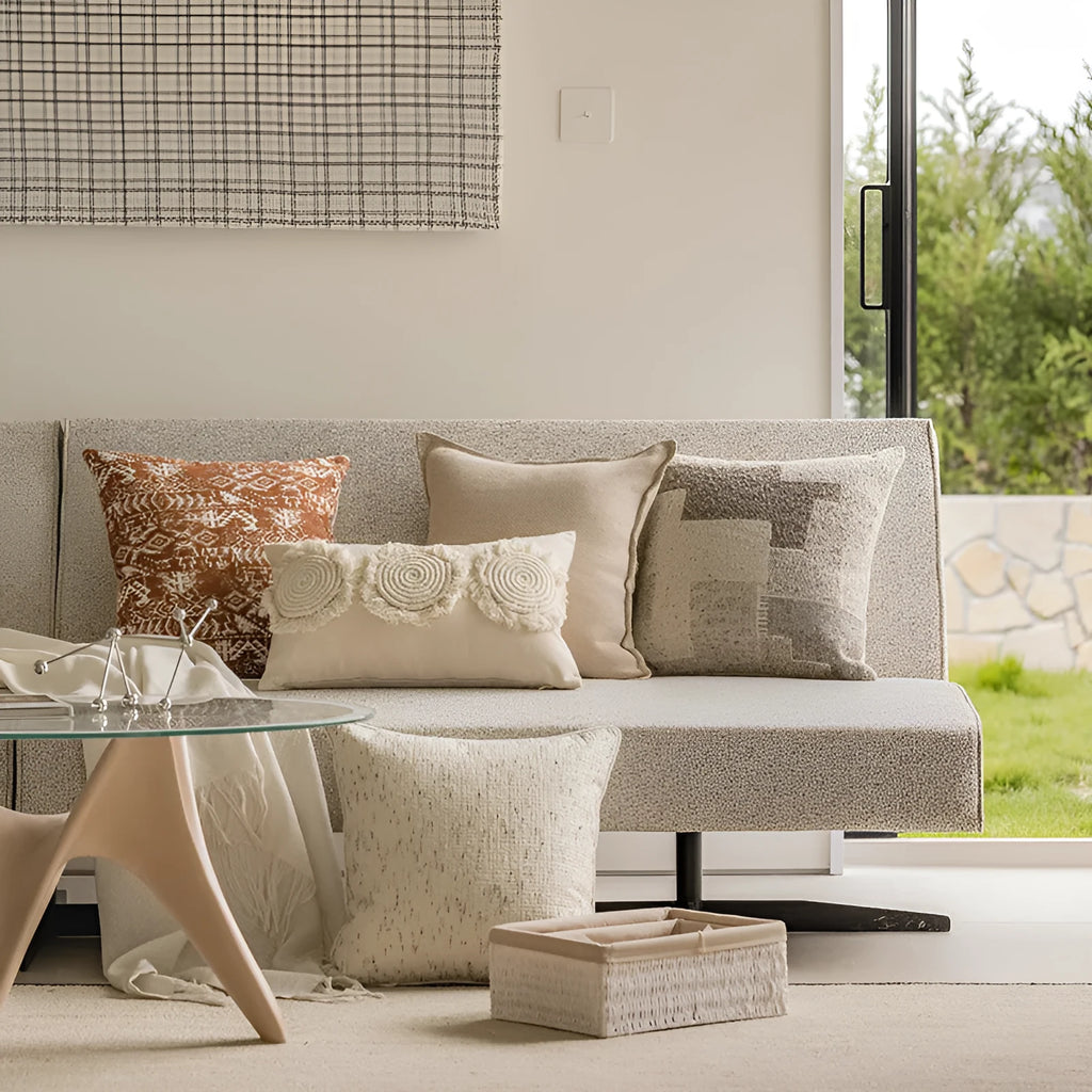 Solid colour sofa cushion pillow on a chair, showing artificial line edge pressing detail.