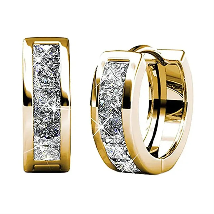 A pair of geometric quadrilateral earrings for women in a gold or silver metal finish.