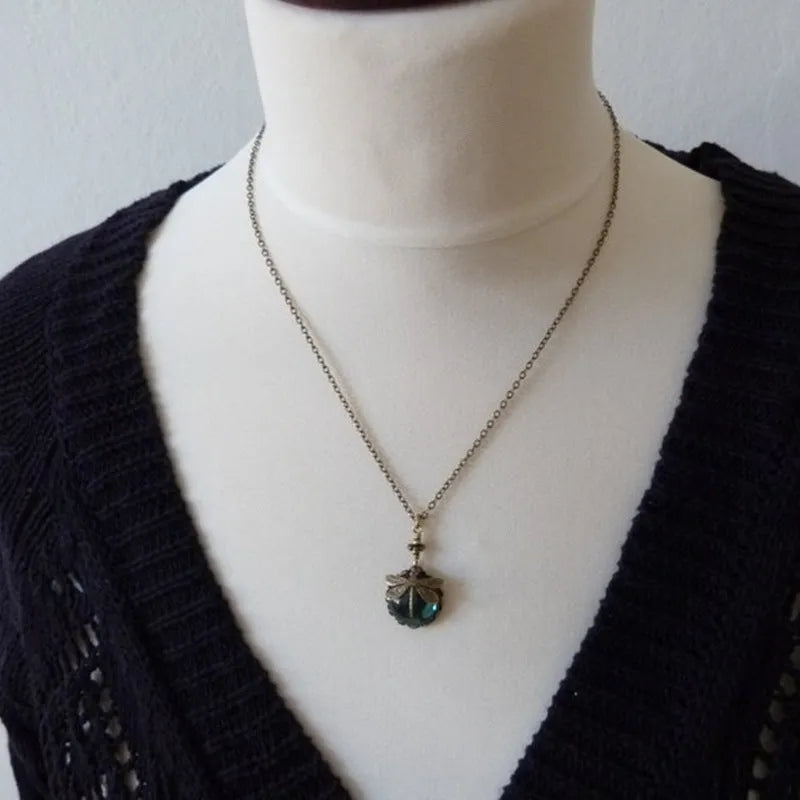 Yellow dragonfly pendant necklace with hand-carved vintage bronze design on 925 silver