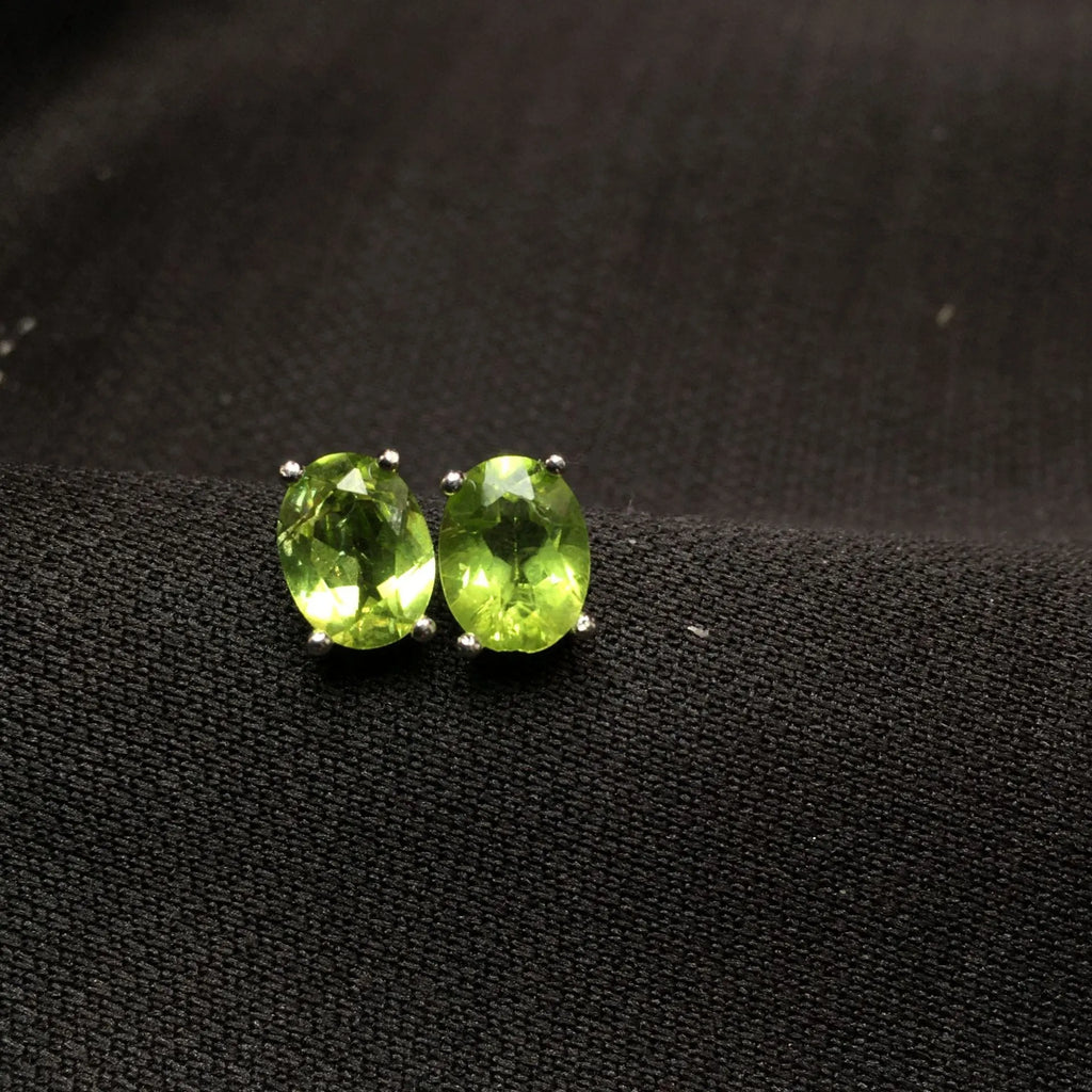 S925 sterling silver stud earrings with oval green olivine gemstone