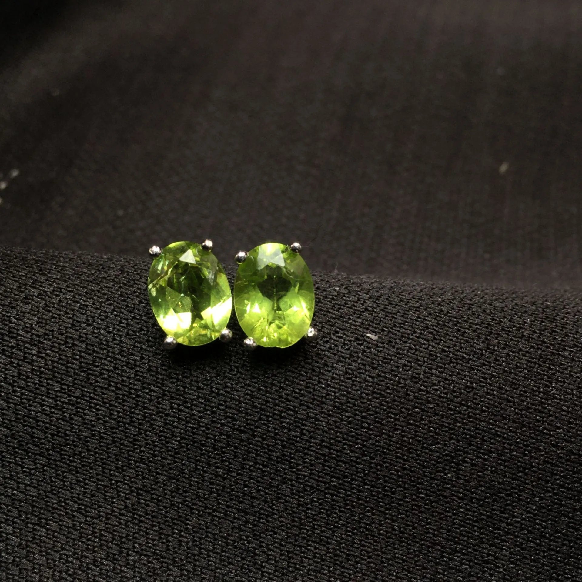 S925 sterling silver stud earrings with oval green olivine gemstone