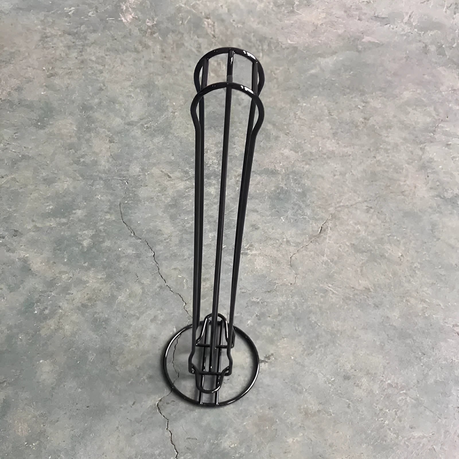 Wrought iron coffee capsule storage rack holding 20 capsules in black or silver finish