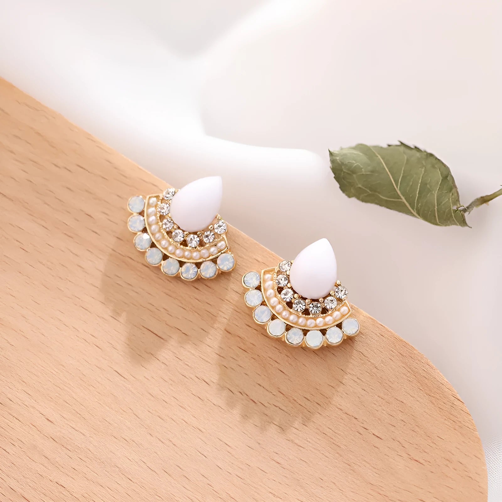 Women's retro fan-shaped needle earrings with sterling silver electroplating and rhinestone accents