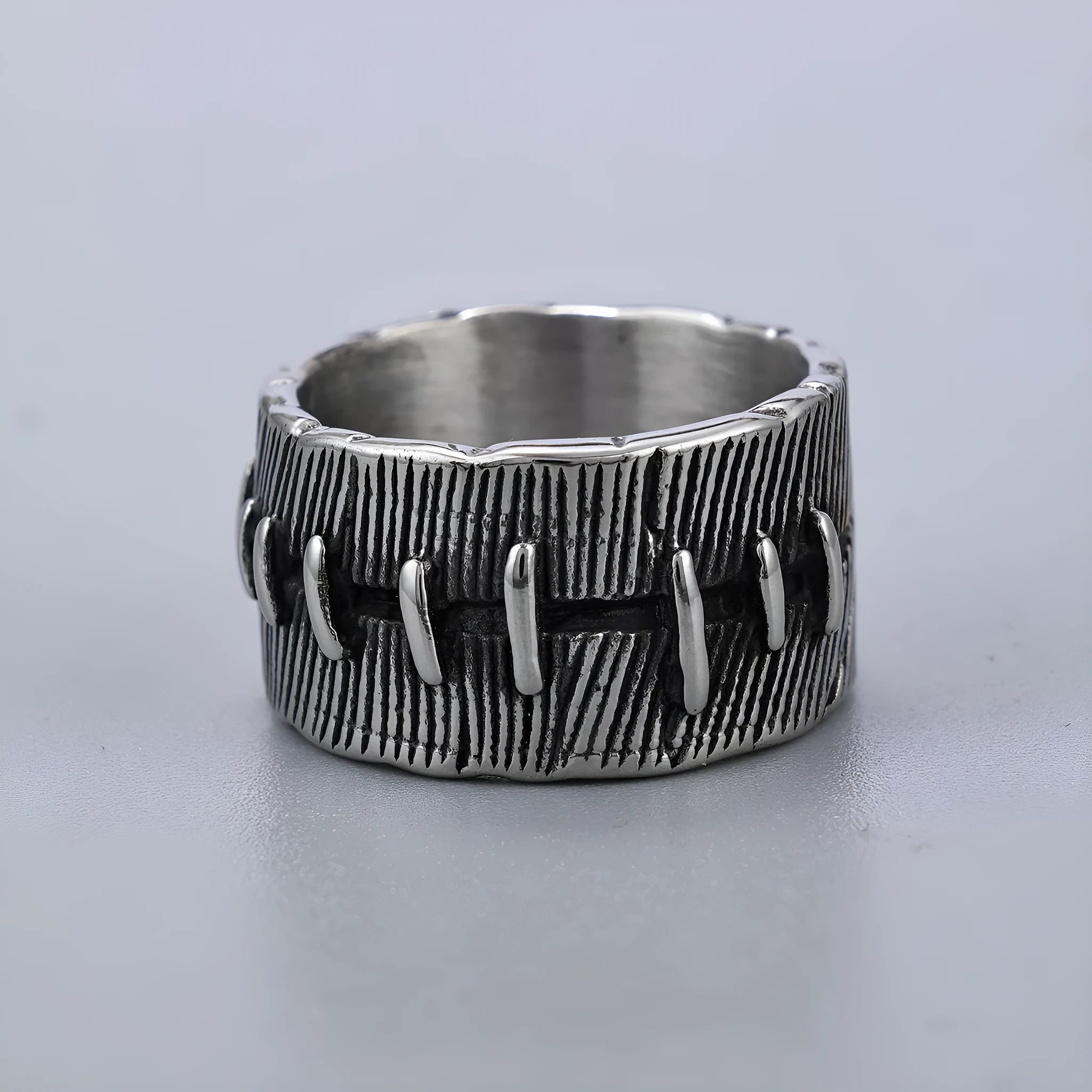 Titanium steel dark punk stitched ring with geometric U-shaped design, retro colour finish