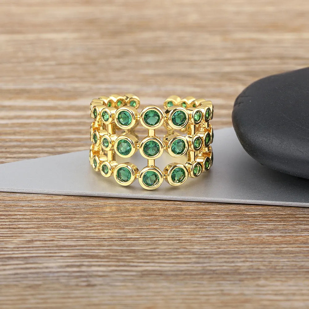 Wide band gold plated copper ring with green zircon stones, unisex jewellery accessory