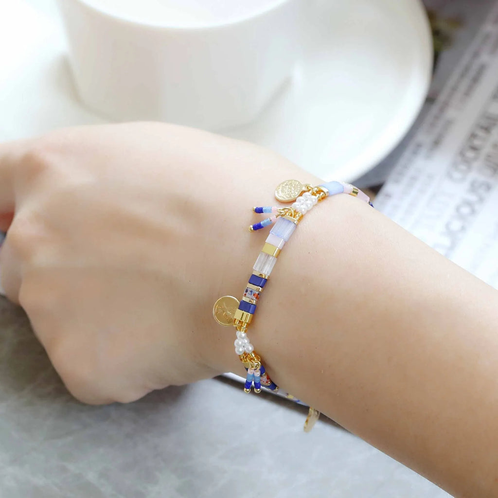 Women's handmade bracelet with imitation pearls and glass coloured beads in six colour options