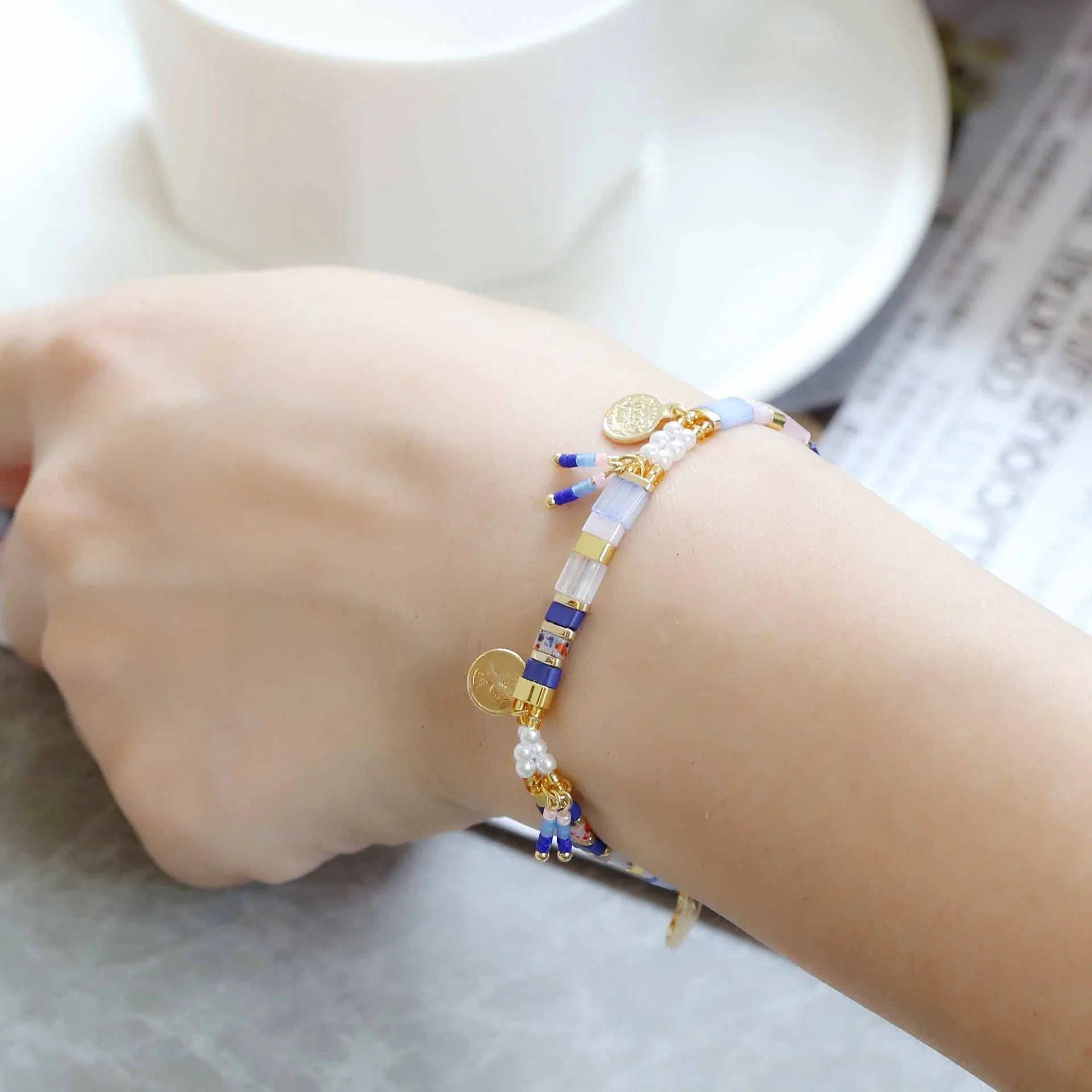 Women's handmade bracelet with imitation pearls and glass coloured beads in six colour options