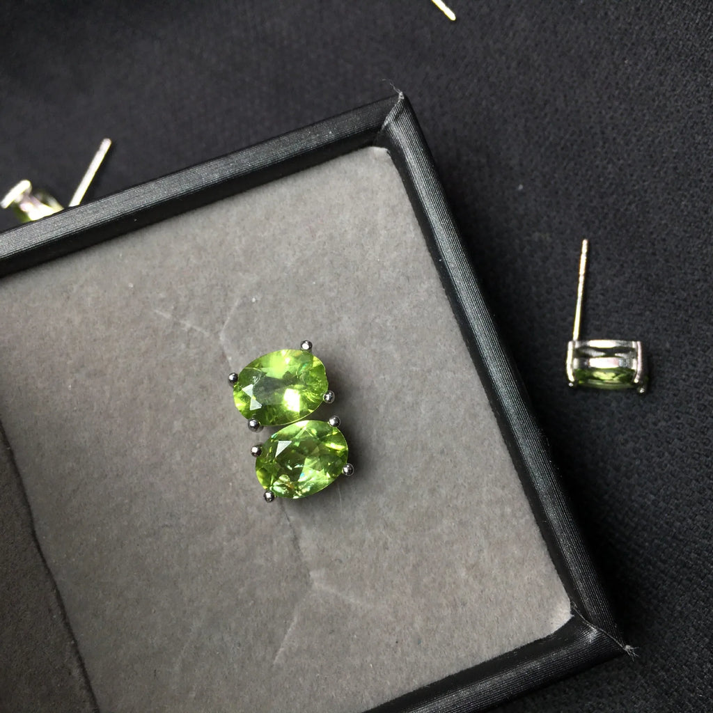 S925 sterling silver stud earrings with oval green olivine gemstone