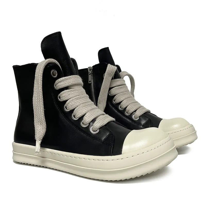 Genuine leather high-top unisex sneakers with side zipper in black, shown on a neutral background.