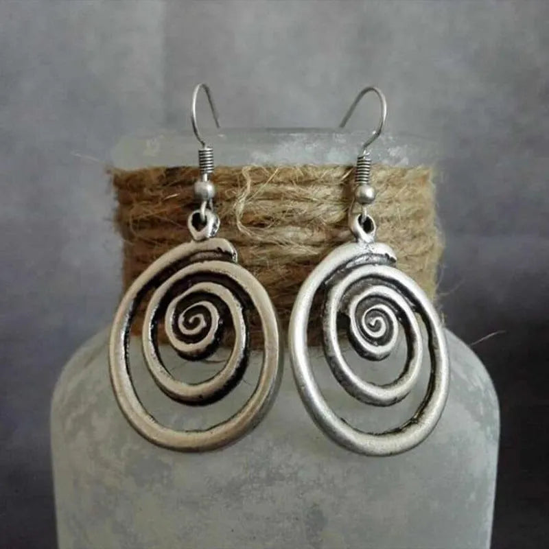 Retro geometric spiral distressed earrings in silver alloy measuring 2.6cm by 5cm