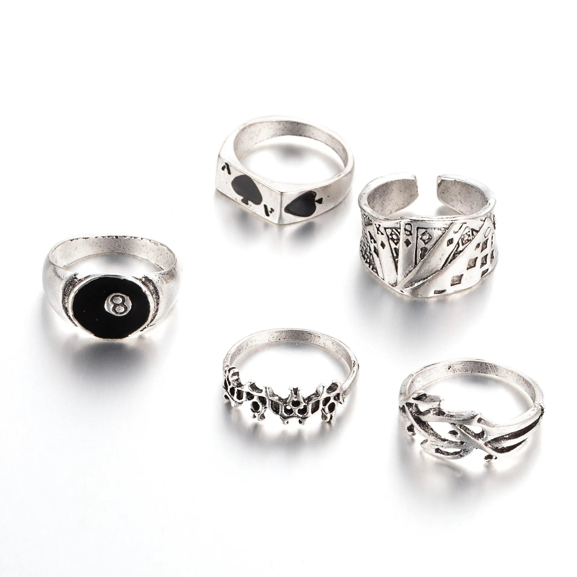 Black alloy poker ring with raised spade card design on band