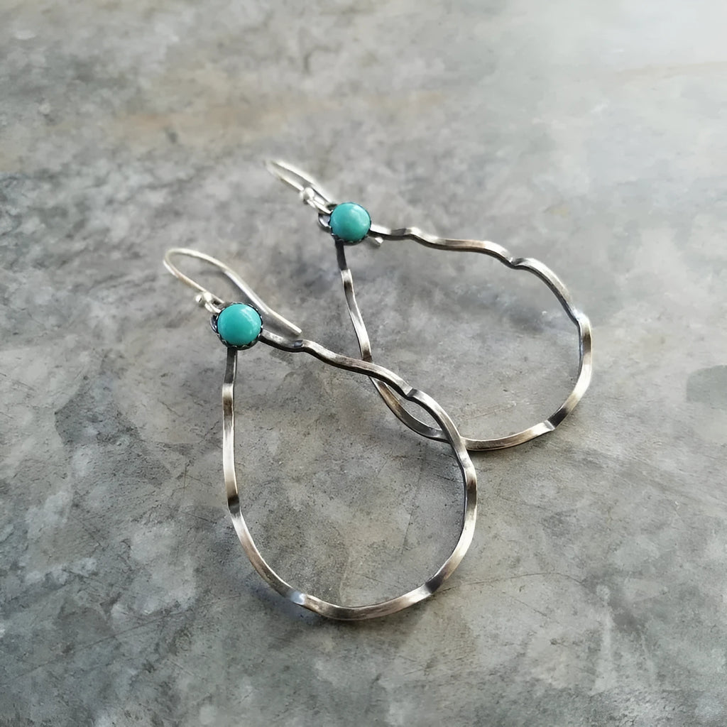 Bohemian geometric earrings with turquoise circles in antique silver colour alloy construction