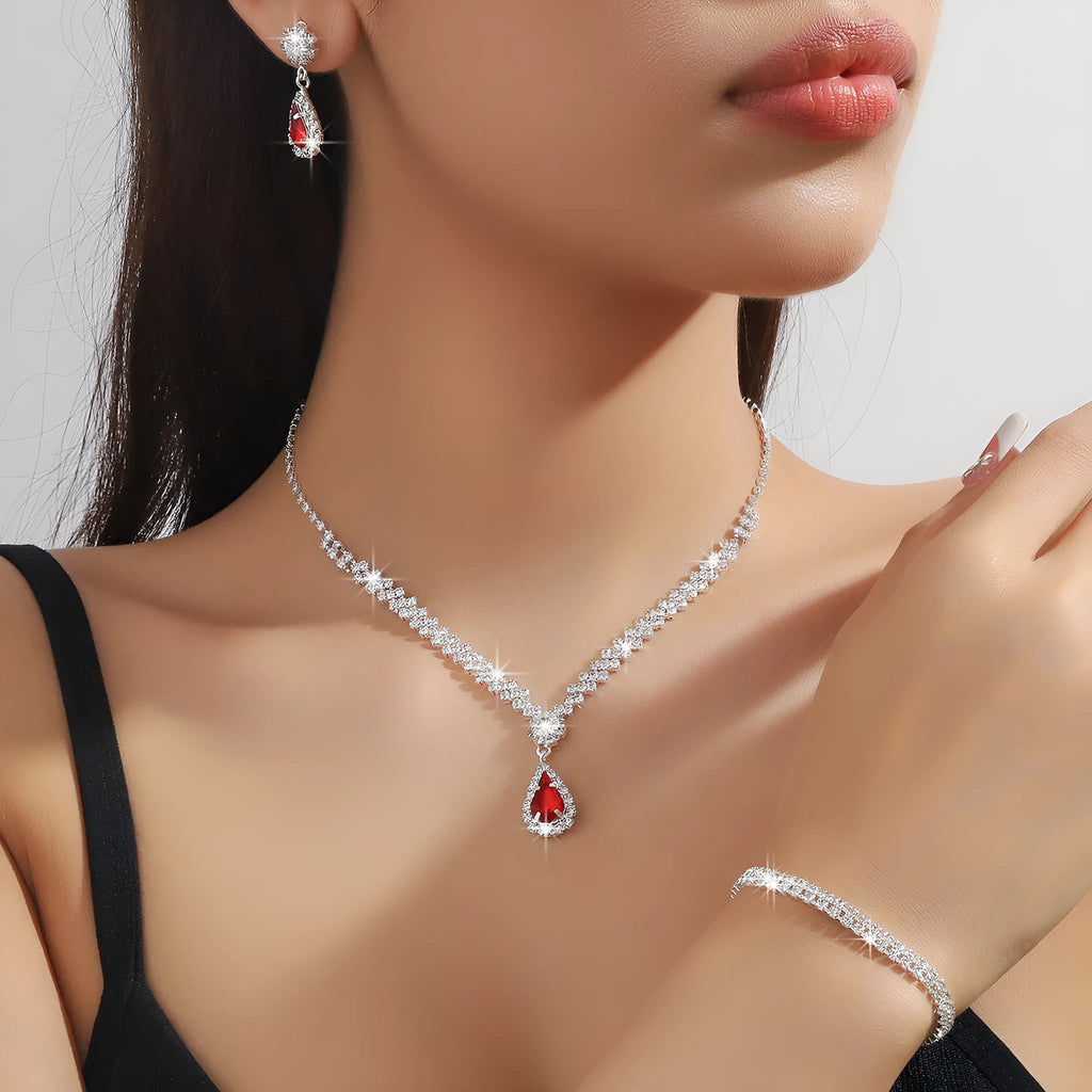 Rhinestone claw chain necklace and earrings set with water drop shape, available in multiple colours for women.