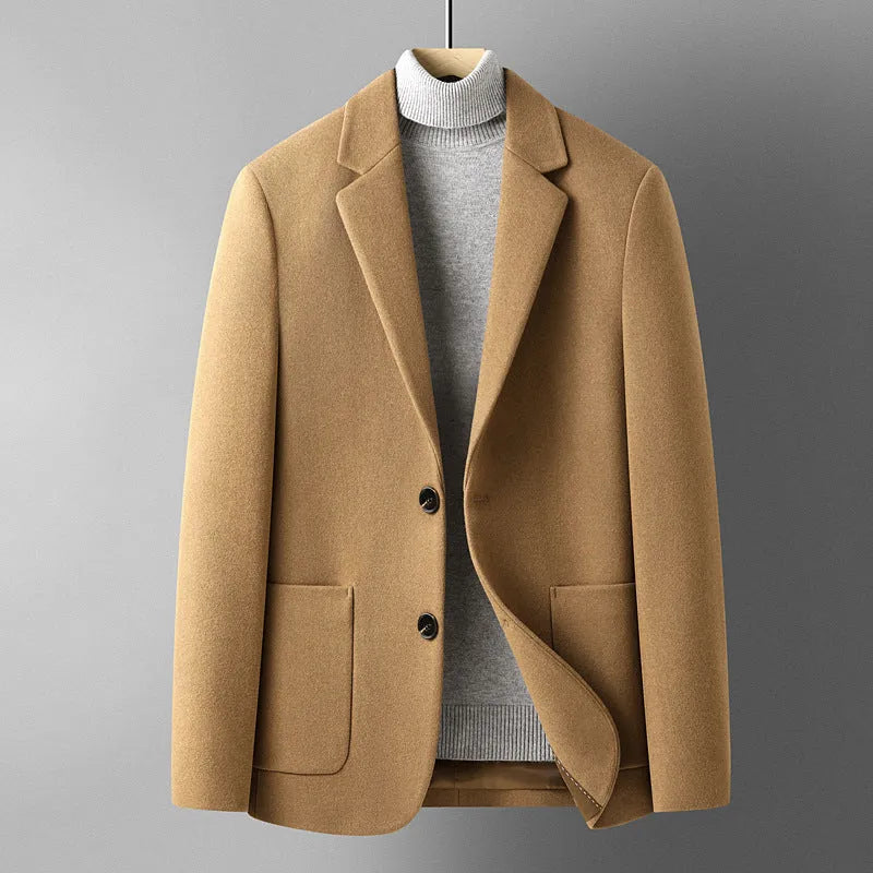 Men's slim fit wool suit jacket in grey, shown on a model, suitable for autumn casual wear.