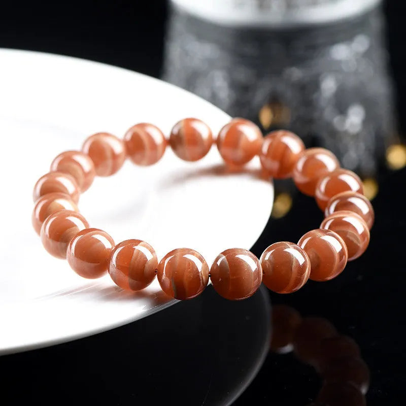 Natural rhodochrosite round bead bracelet with geometric Ruyi design in 6mm or 8mm Peruvian mineral