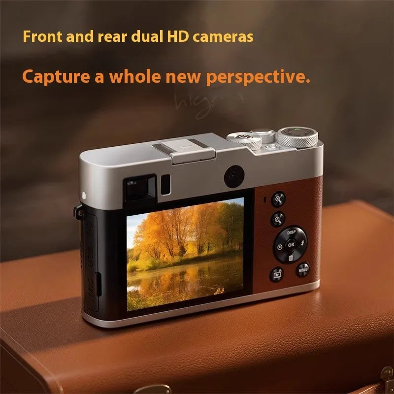 Black 5K HD digital camera with dual lenses, optical viewfinder, and 2.88-inch screen on a table