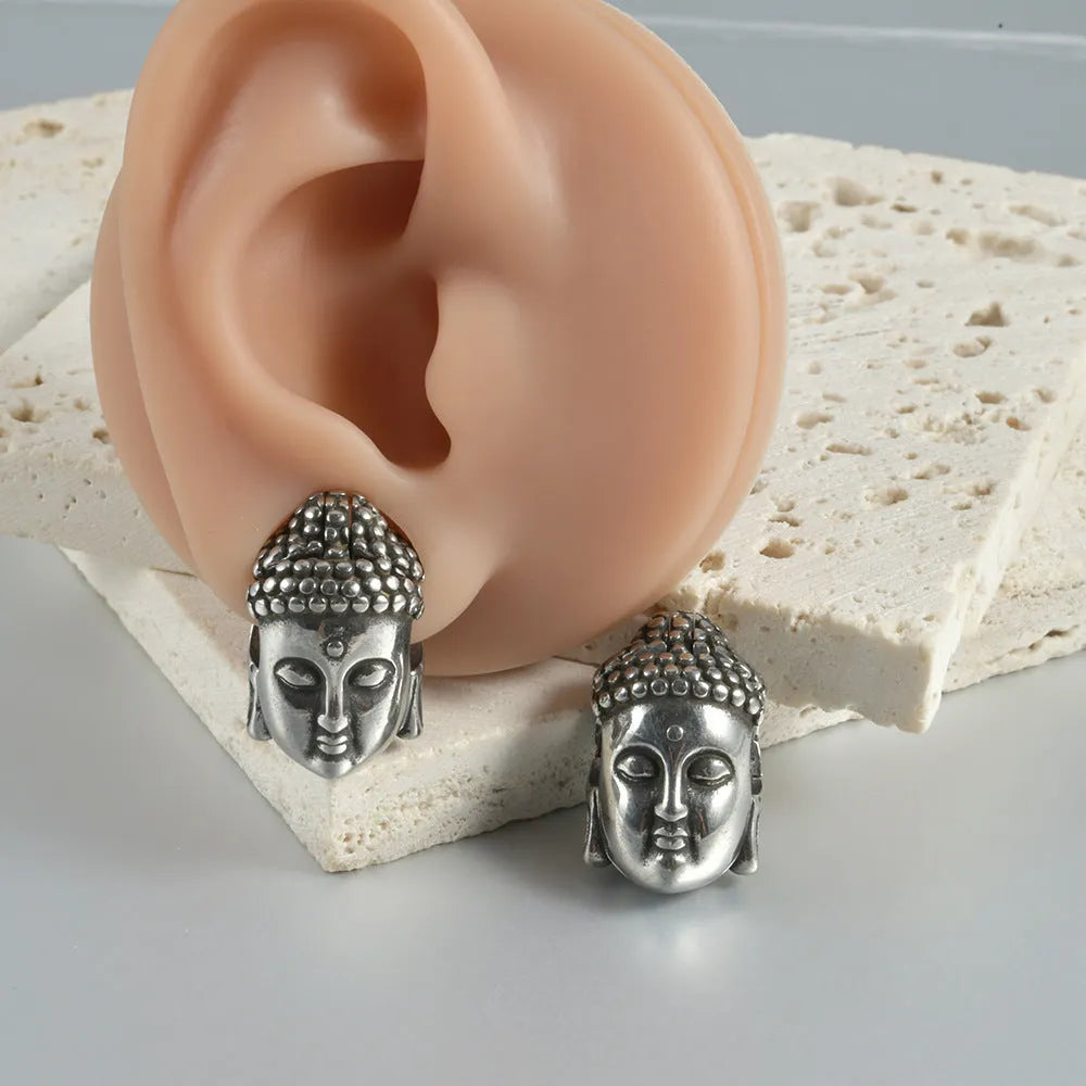 Stainless steel hollow skull Buddha geometric earrings in hip hop style with electroplated finish