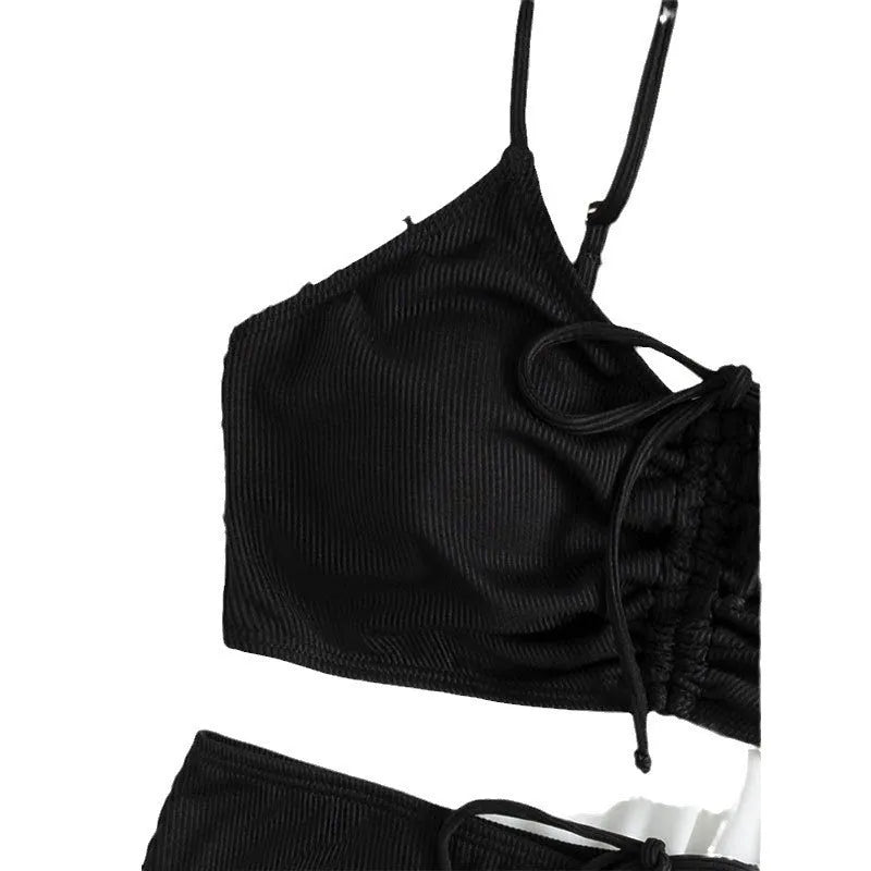 Women's black nylon sling split high waist bikini swimsuit set with top and shorts