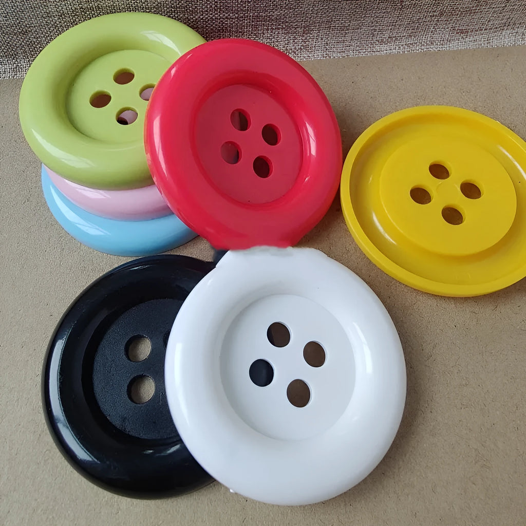 Oversized round plastic nylon button with four holes in 38mm size white colour