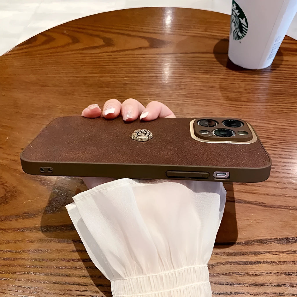 Brown frosted PC silicone phone case with camellia design for iPhone 11 to 15 series