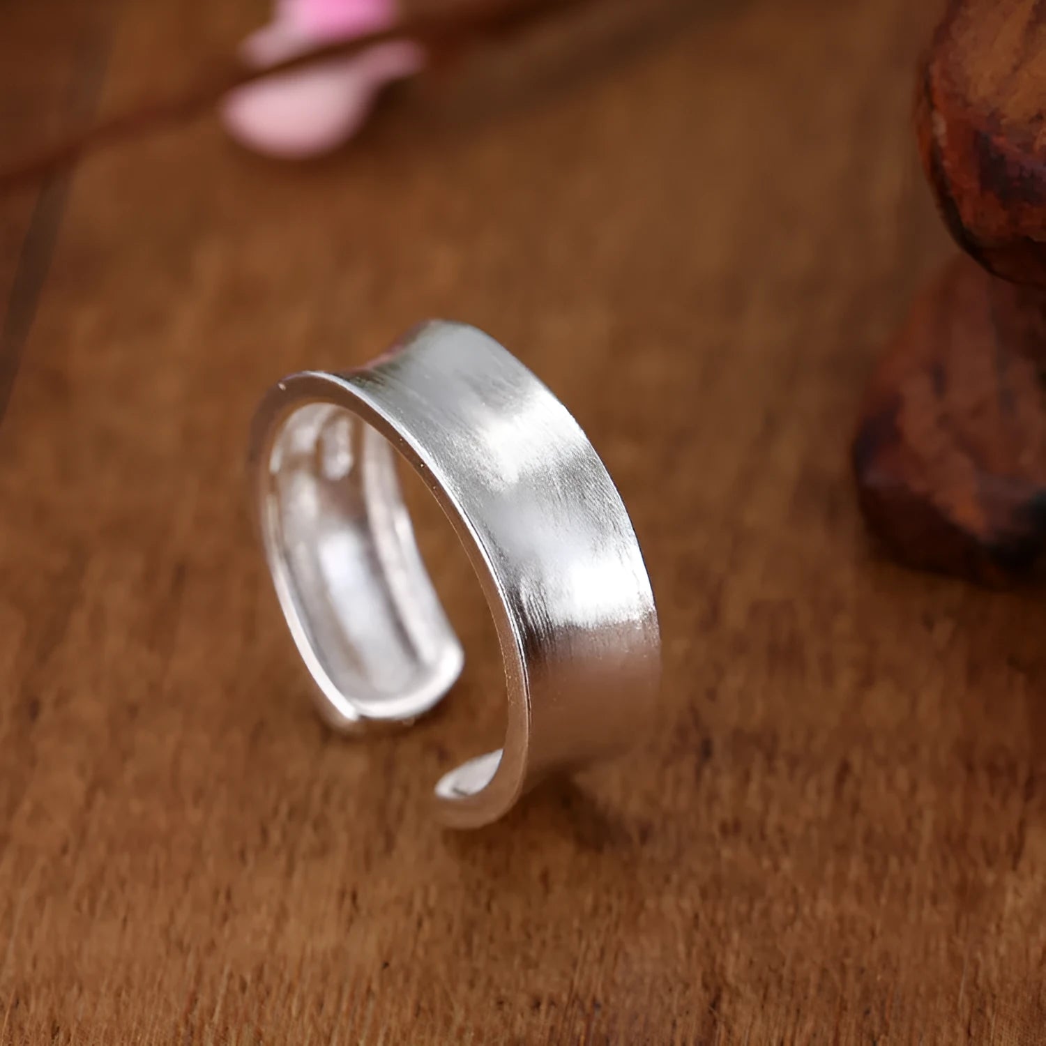 Geometric open ring with frosted silver finish and adjustable opening design