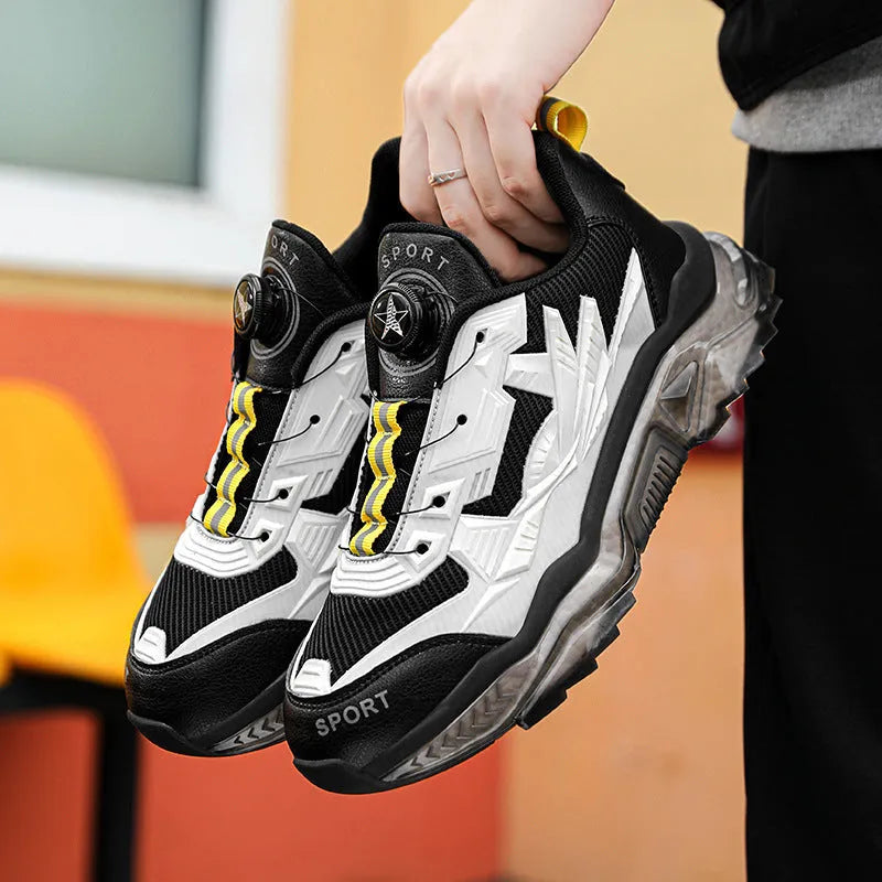 Men's black rotating button casual dad shoes with mesh upper and low platform sole.