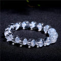 Natural white crystal ghost pyramid bracelet with Ruyi elements showing pyramid shapes and original design