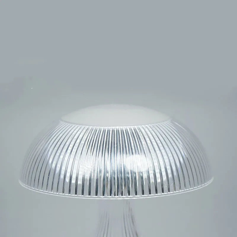 Rechargeable touch lamp with acrylic body showing three colour changing modes