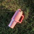 Large stainless steel vacuum insulation cup with rainbow colour finish showing 27.5cm height