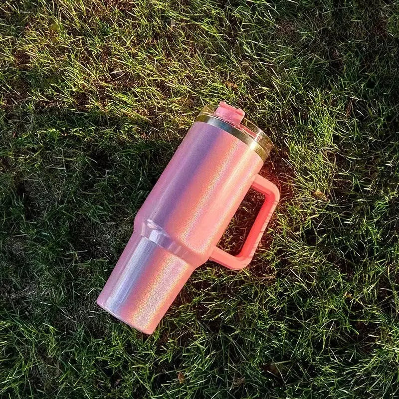 Large stainless steel vacuum insulation cup with rainbow colour finish showing 27.5cm height