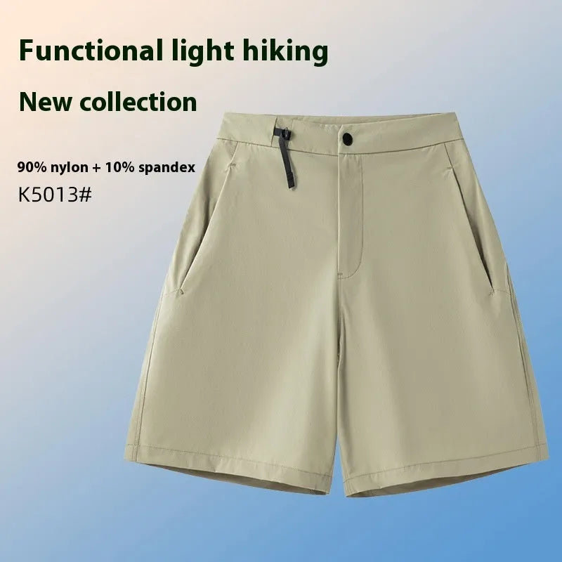 Men's solid colour quick-dry sports shorts with elastic waistband shown in Army Green