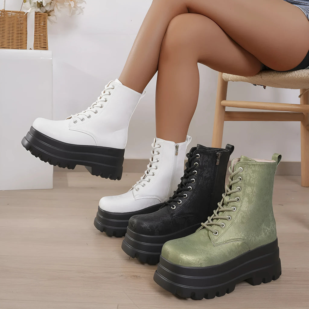 Women's white retro platform ankle boots with patchwork detail and a chunky heel.