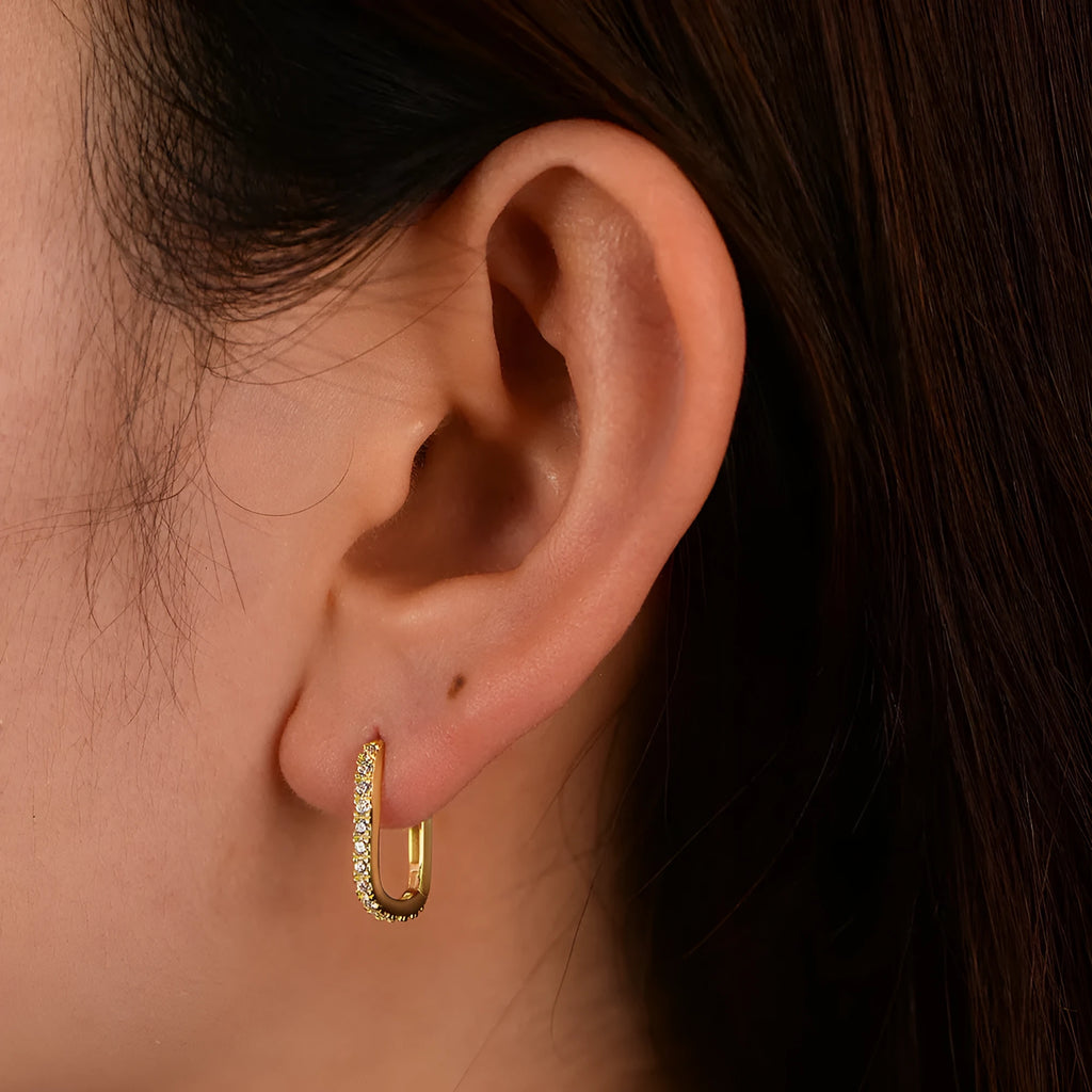 S925 sterling silver oval zircon earrings with ear clip fastening in geometric design