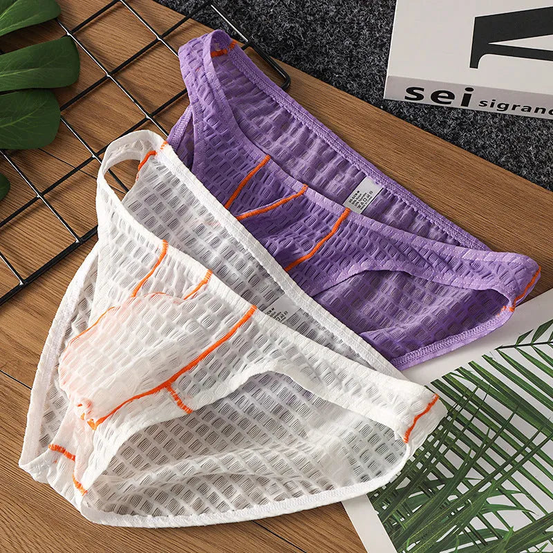 Men's low waist lace briefs in ice silk fabric on a colour swatch showing white, black, green, red, and purple.