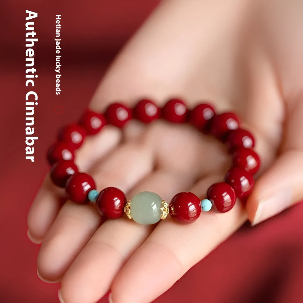 Purple Gold Sand cinnabar Hetian jade bead bracelet in geometric elliptical shape on wrist.