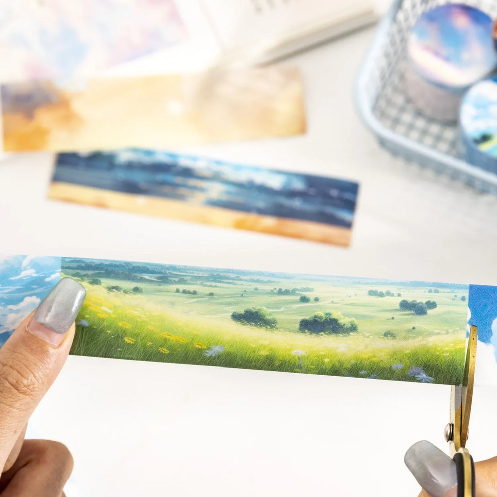Japanese paper washi tape journal stickers showing six sky patterns including colourful clouds and twilight on 30mm wide 2m long roll