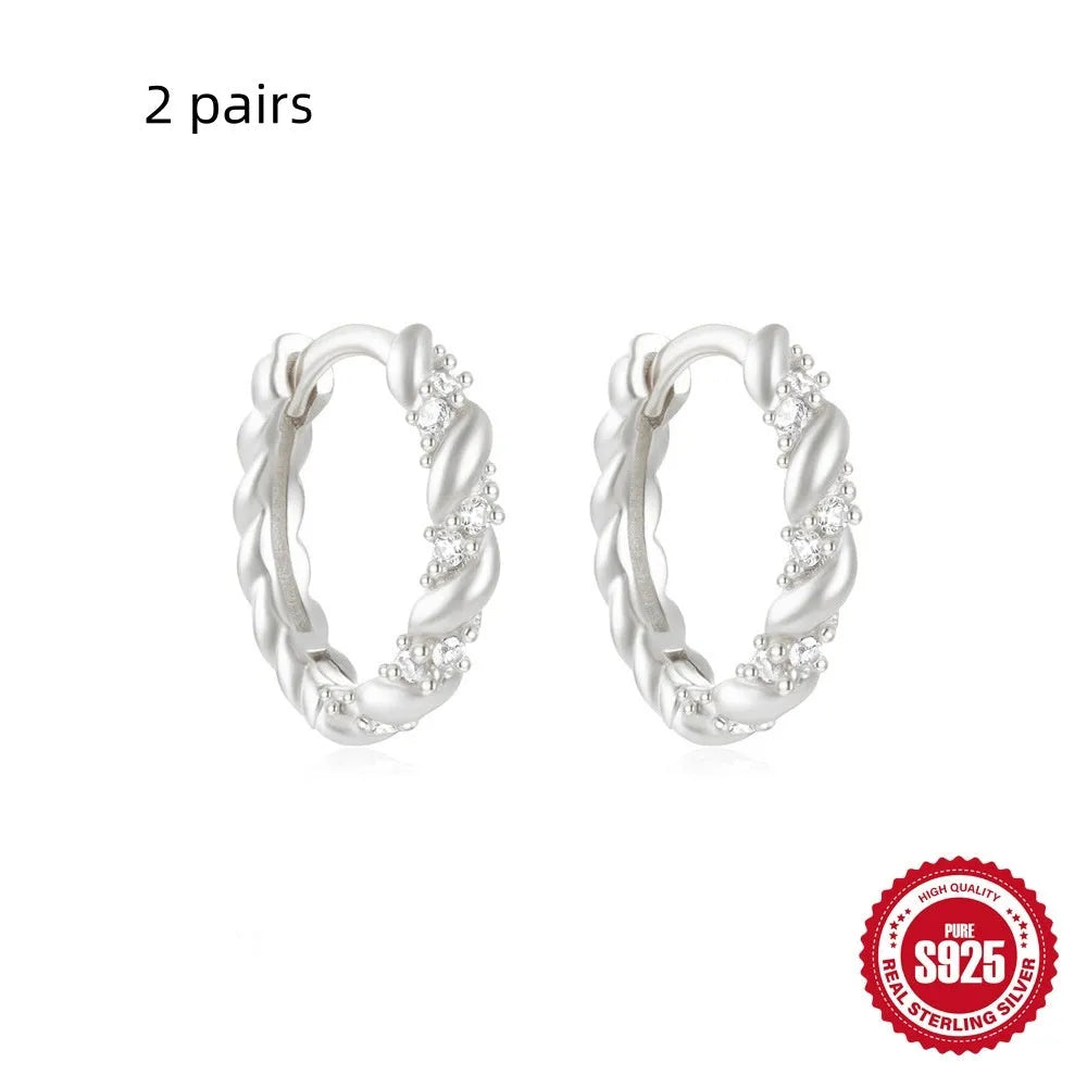 Sterling silver geometric stud earrings with round design in gold or silver electroplated finishes