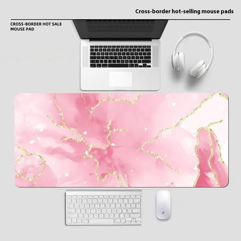 Large diatom ooze mouse pad with printed pattern, non-slip rubber sole, and polyester surface for desk use