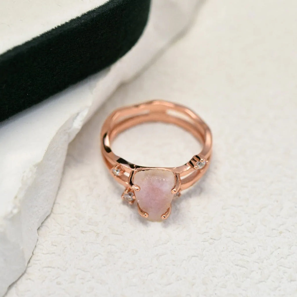 S925 silver geometric ring with irregular triangle design and moonstone, shown in rose gold finish.