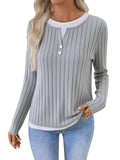 Women's black fake two-piece round neck button pullover sweater with grinding design