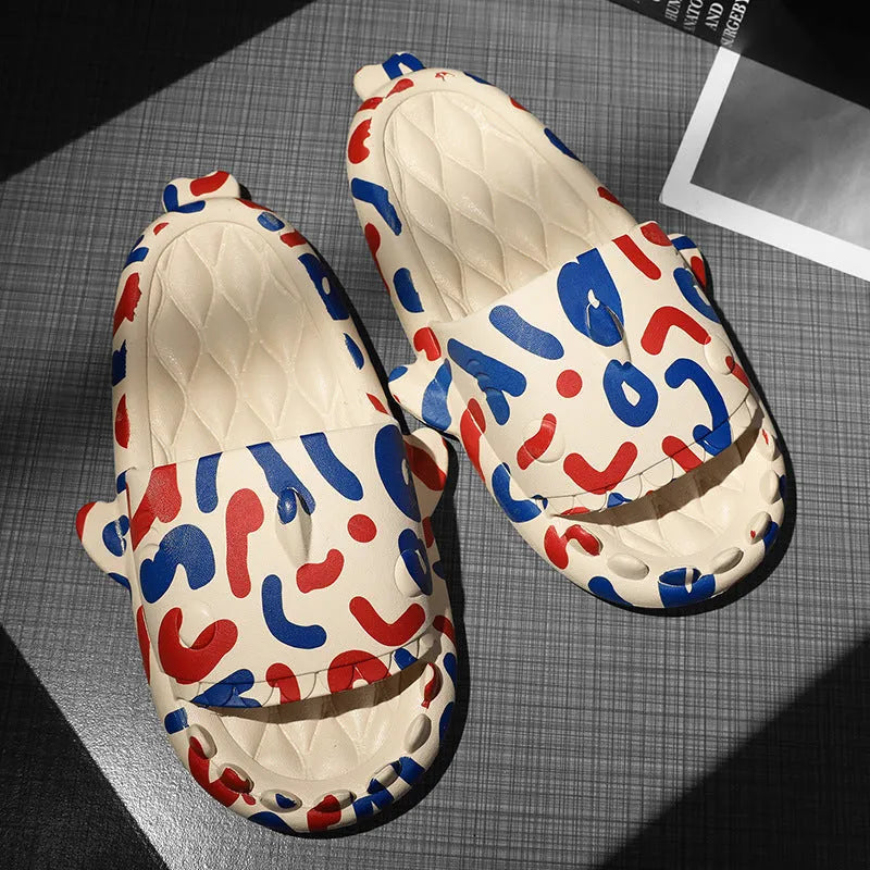 Shark couple design open-toe EVA home slippers on a plain background