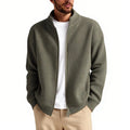 Man wearing a loose fit grey cardigan sweater for casual leisure wear