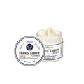 60g glass jar of Cow Fat Moisturising Cream with vitamin and honey formula.
