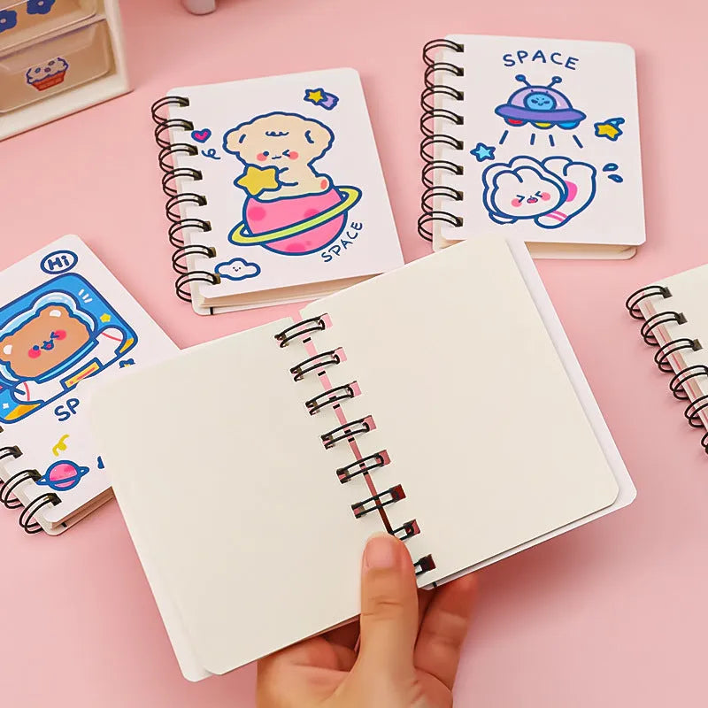 Astronaut themed portable pocket notebook showing soft cover design options and compact 10.5x8cm size