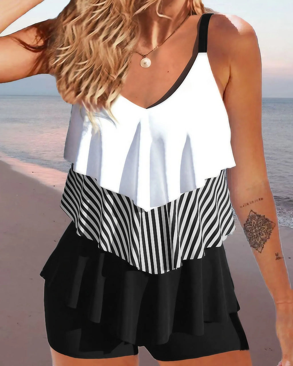 Women's backless bikini swimsuit with spaghetti straps and ruffle trim in solid colour, floral, or gradient patterns