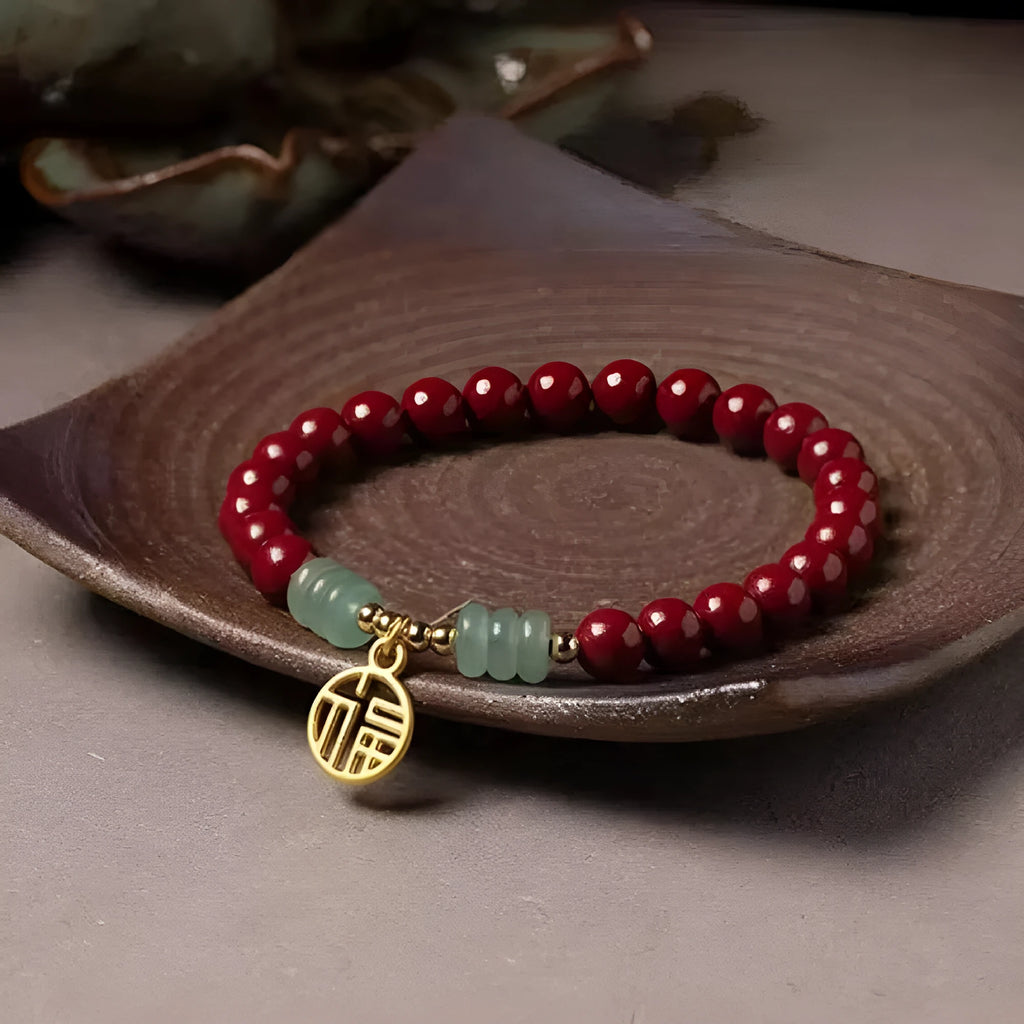 Gold cinnabar wave bracelet with copper bead on wrist, unisex national style