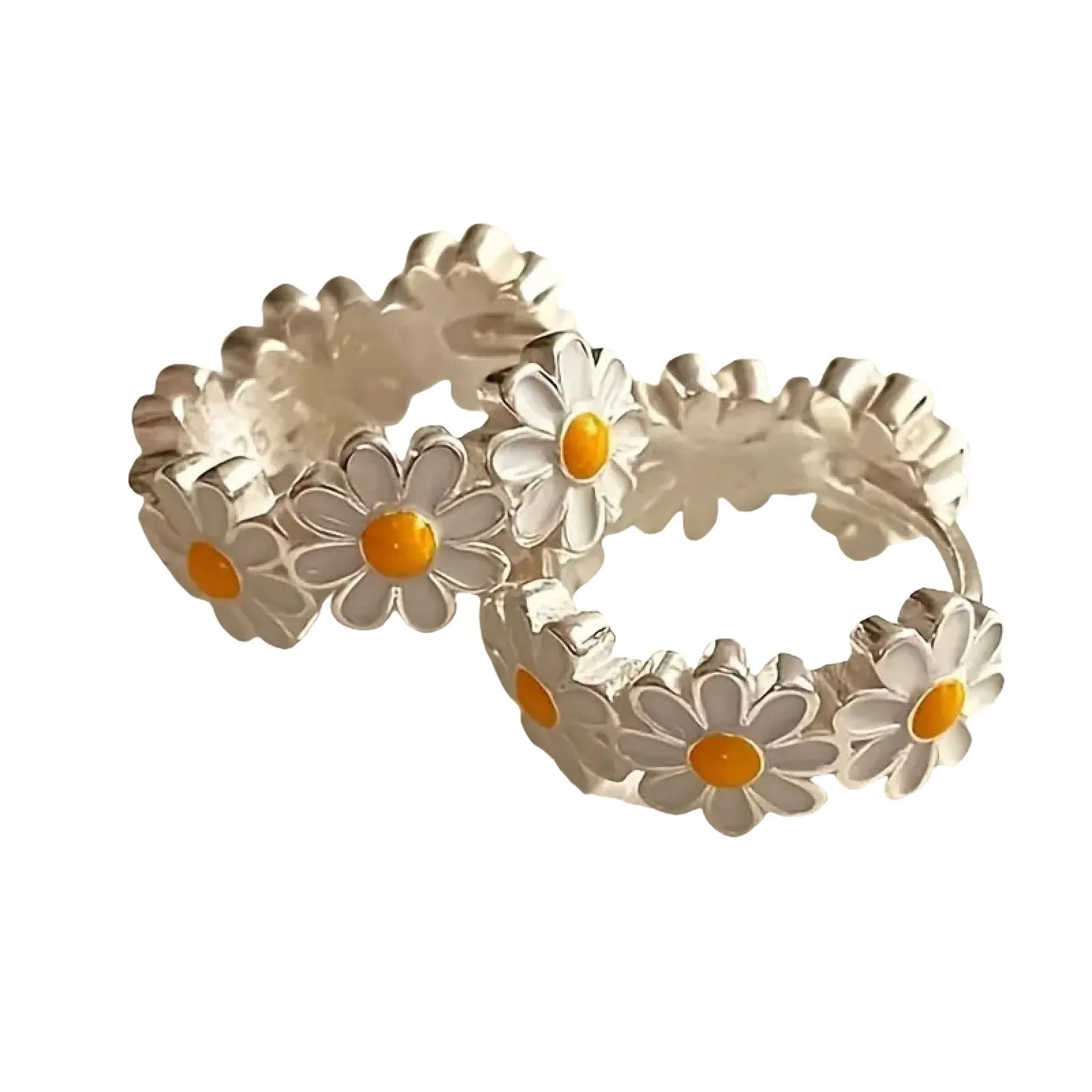 A pair of white daisy flower ring earrings with platinum inlaid gemstones on a copper base.