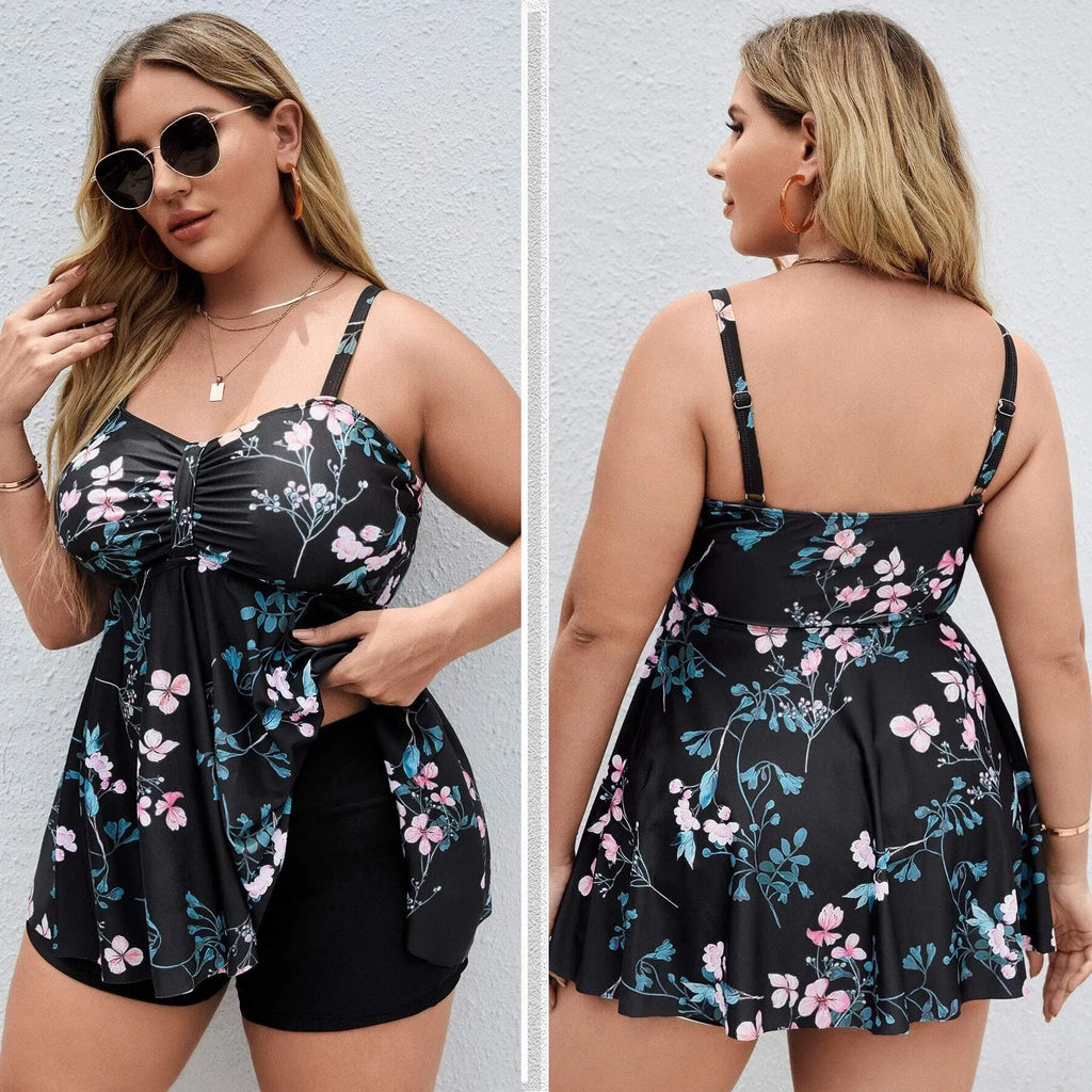 Women's floral print one-piece swimsuit on hanger, showing split colour design.