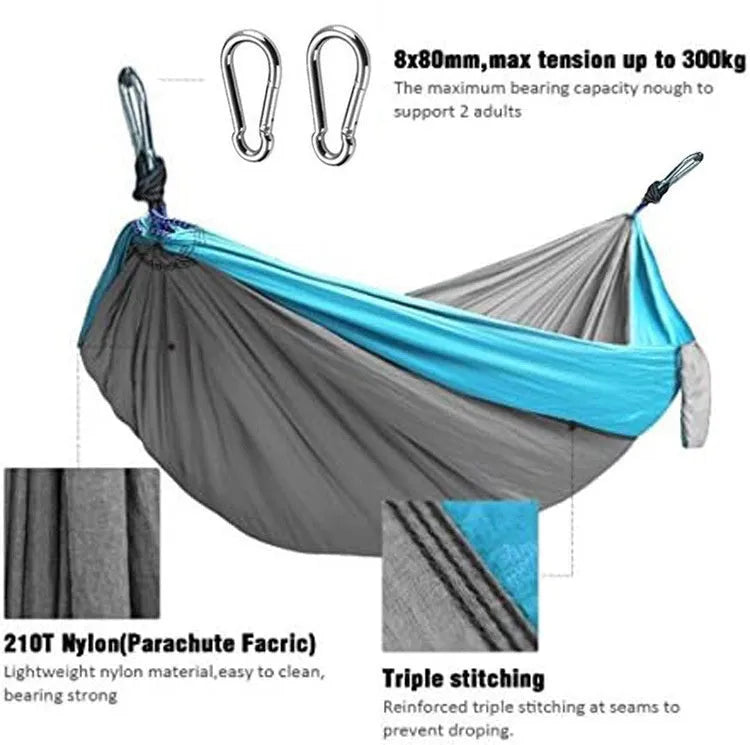 Blue nylon parachute cloth outdoor hammock with 300kg capacity hanging between trees
